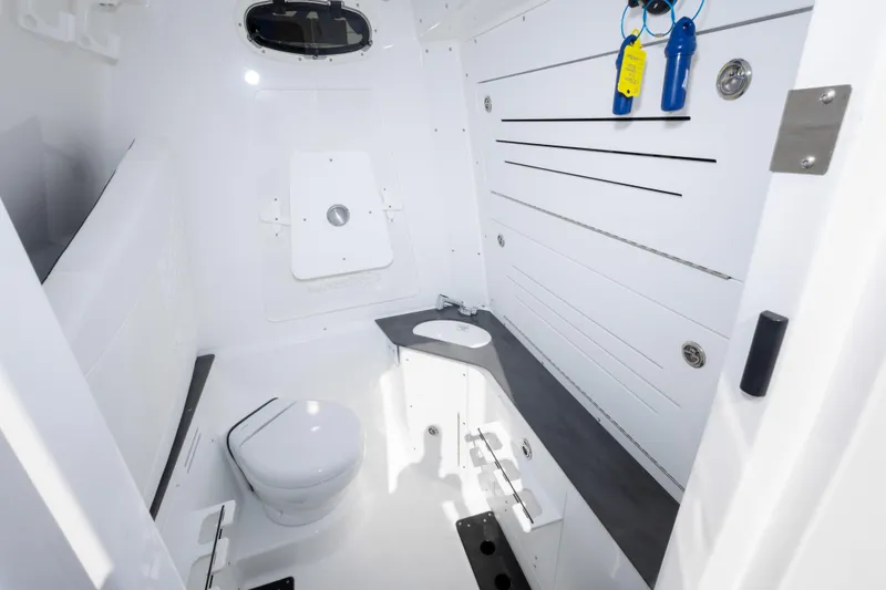 Slide: The Image of 2026 Crevalle 33 CSF boat interior with modern bathroom amenities. - 48
