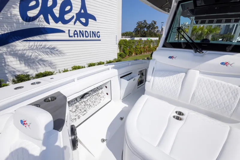 Slide: The Image of 2026 Crevalle 33 CSF boat interior with white seating at Veres Landing. - 54
