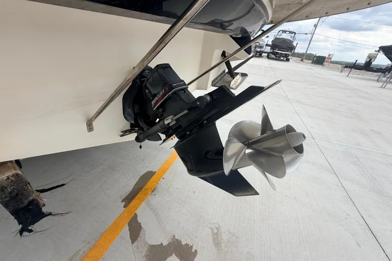 Slide: The Image of 2002 Sea Ray 290 Bowrider with Mercury outdrive and stainless steel propeller. - 37