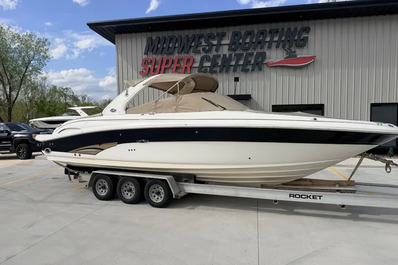 Slide: The Image of 2002 Sea Ray 290 Bowrider on trailer at Midwest Boating Super Center. - 7