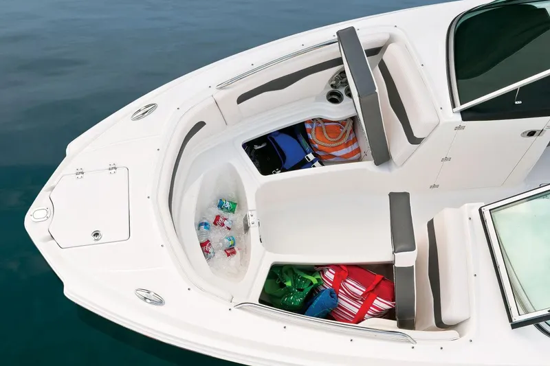 Slide: The Image of Manufacturer Provided Image: 2016 Chaparral 246 SSi boat interior with storage compartments and seating. - 10