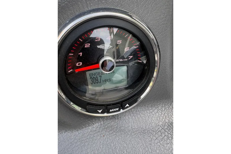 Slide: The Image of Tachometer of 2016 Chaparral 246 SSi showing 309.7 engine hours. - 8