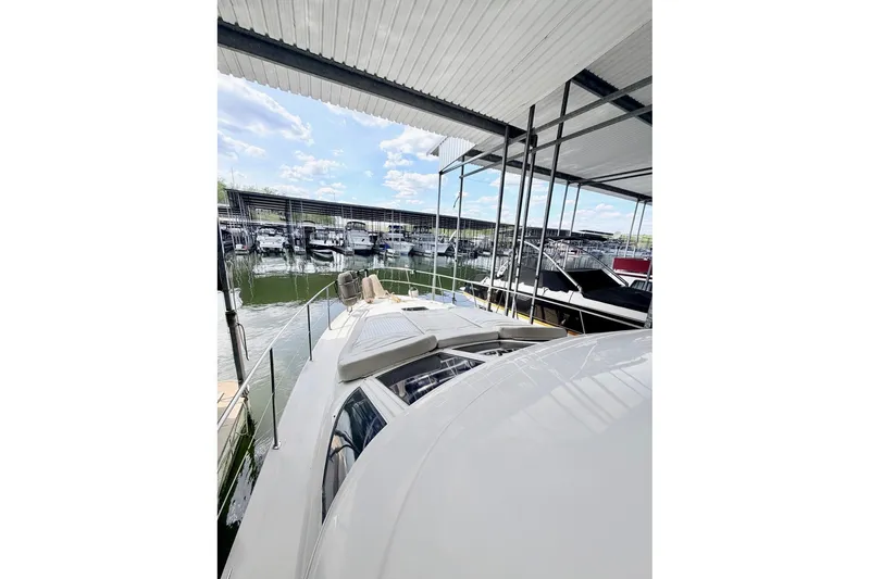 Slide: The Image of Engine compartment of a 1996 Sea Ray 420 Aft Cabin with visible gauges and hoses. - 33