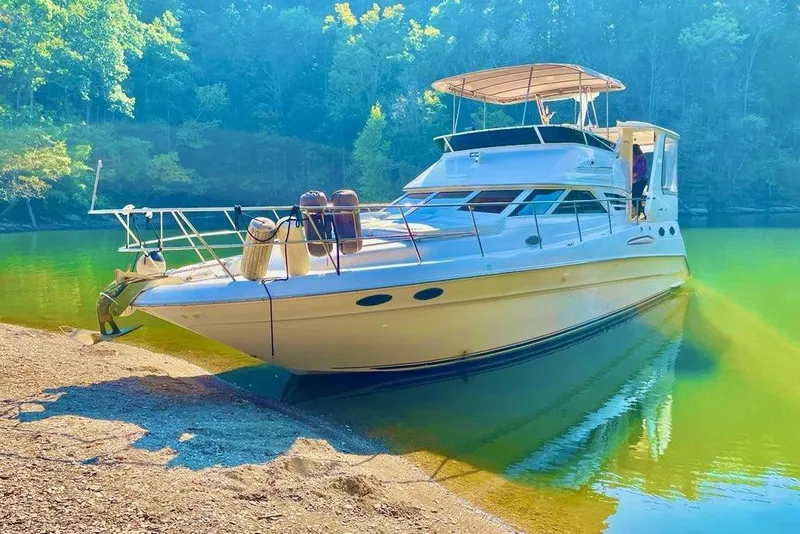Slide: The Image of Engine compartment of a 1996 Sea Ray 420 Aft Cabin boat, featuring a Westerbeke generator. - 39