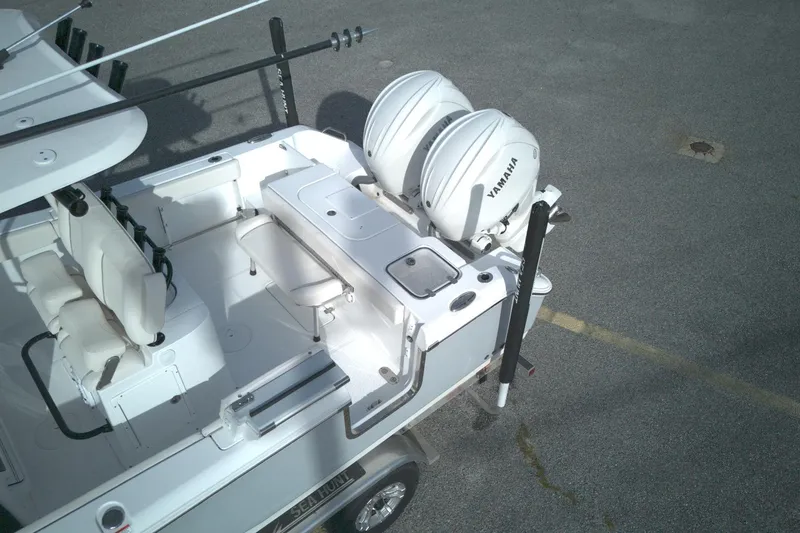 Slide: The Image of 2024 Sea Hunt Gamefish 25 boat with dual Yamaha engines, aerial view. - 12