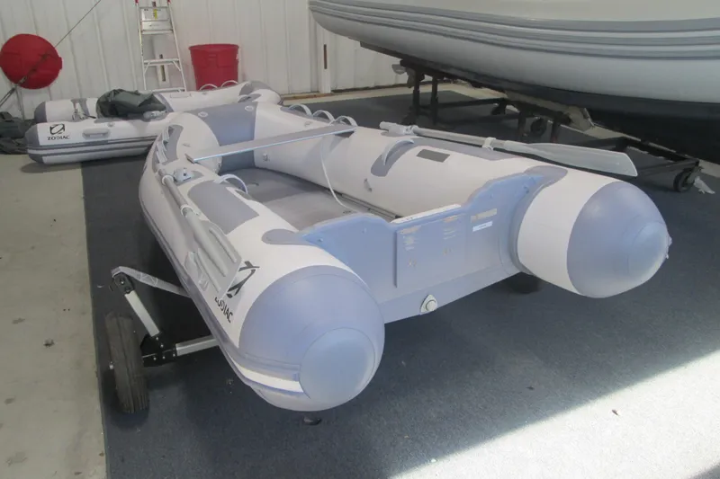 Slide: The Image of 2023 Zodiac Cadet 310 Alu inflatable boat in showroom, featuring durable design and compact size. - 3