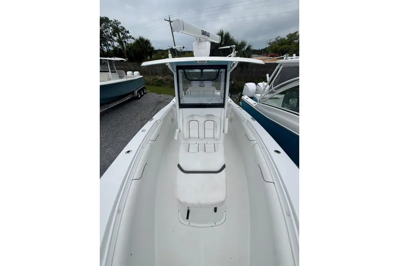 Slide: The Image of 2017 Sea Hunt Gamefish 30 boat with spacious deck and center console. - 9