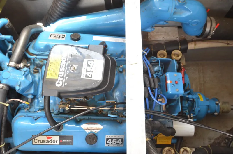 Slide: The Image of 1991 Carver 33 Aft Cabin engine compartment with Crusader 454 engine. - 33