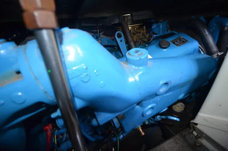 Slide: The Image of Close-up of the engine in a 1991 Carver 33 Aft Cabin boat. - 34