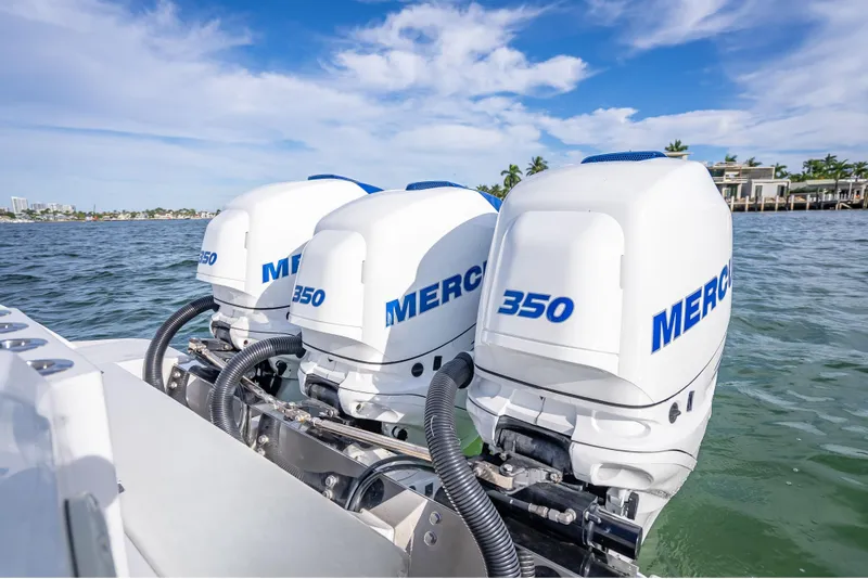 Slide: The Image of Triple Mercury 350 engines on a 2015 Nor-Tech 340 Sport Center Console boat. - 19