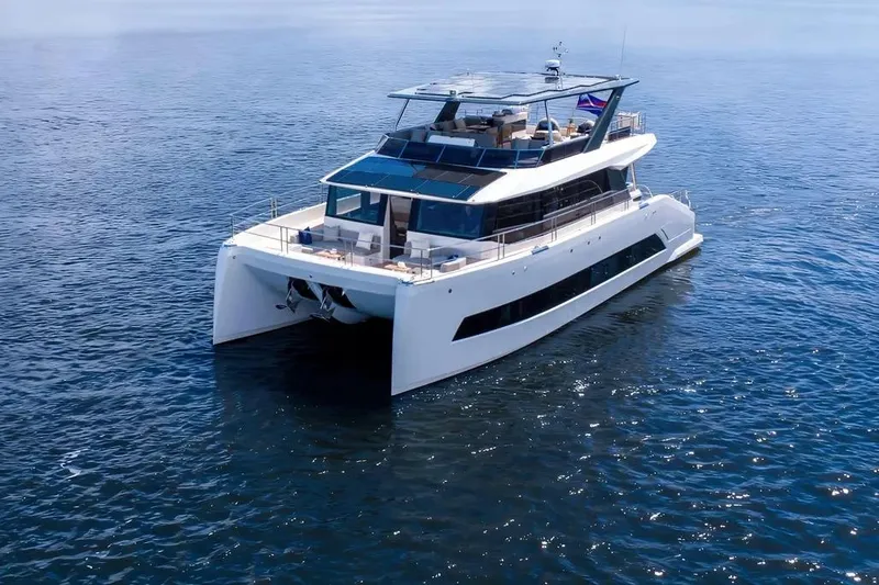 Slide: The Image of Luxurious 2026 Oceanwalker S60 yacht cruising on open water, showcasing sleek design and spacious decks. - 3