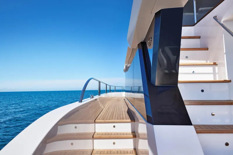 Slide: The Image of Luxury Oceanwalker S60 yacht deck and stairs, 2026 model, with ocean view. - 6