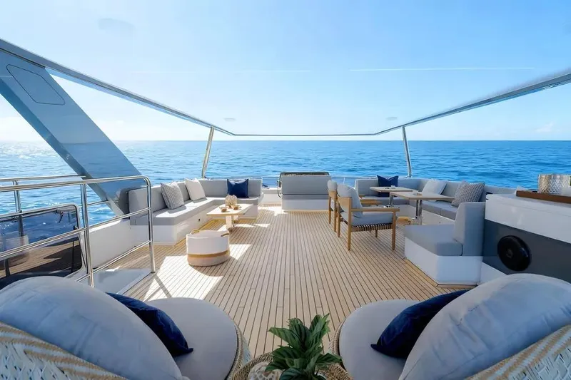 Slide: The Image of Luxurious Oceanwalker S60 yacht deck, 2026 model, featuring elegant seating and ocean views. - 8