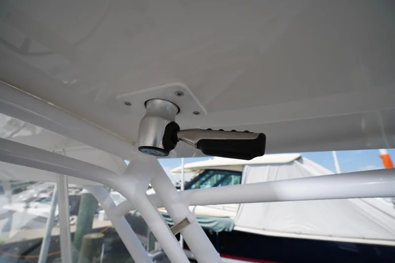 Slide: The Image of Close-up of a 2015 Intrepid 400 Cuddy boat's handle mechanism. - 117