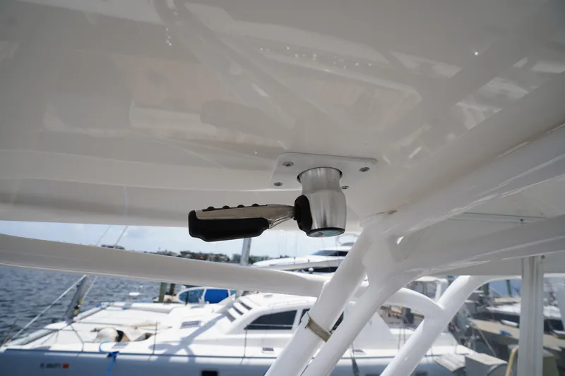 Slide: The Image of Close-up of a 2015 Intrepid 400 Cuddy boat's handle mechanism. - 118