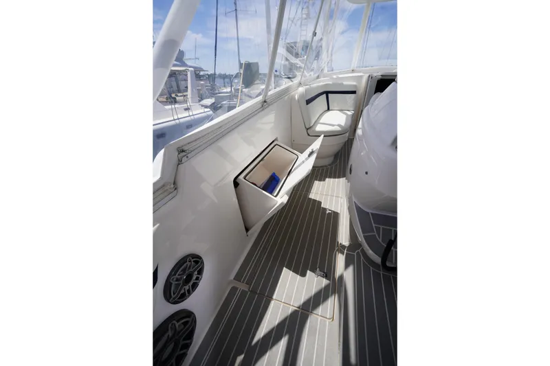 Slide: The Image of Interior of 2015 Intrepid 400 Cuddy boat with seating and storage. - 121