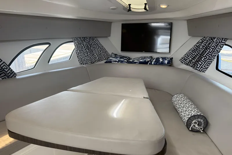 Slide: The Image of Interior of 2015 Intrepid 400 Cuddy boat with modern seating and stylish decor. - 23