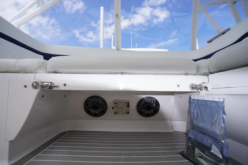 Slide: The Image of Interior view of 2015 Intrepid 400 Cuddy boat with speakers and seating. - 45
