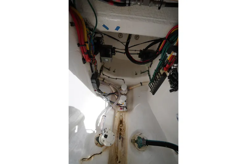 Slide: The Image of Interior wiring and components of a 2015 Intrepid 400 Cuddy boat. - 59