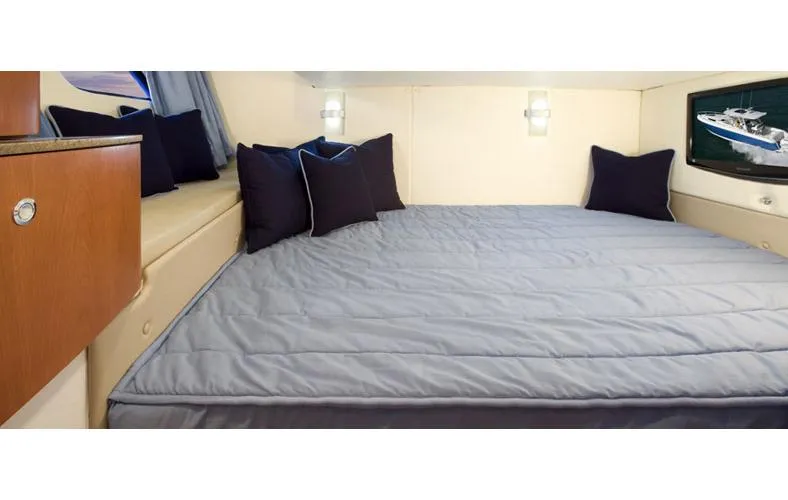 Slide: The Image of Control panel of a 2015 Intrepid 400 Cuddy boat with navigation display. - 7