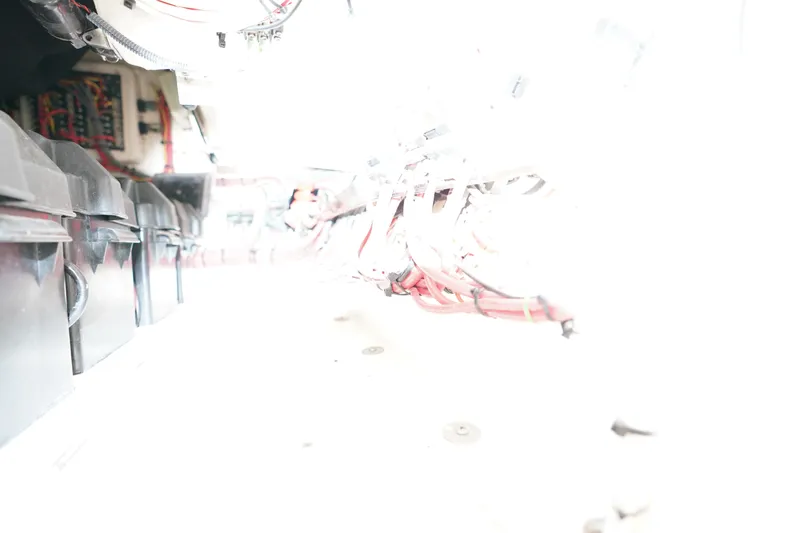 Slide: The Image of Overexposed view of 2015 Intrepid 400 Cuddy's electrical wiring and components. - 74