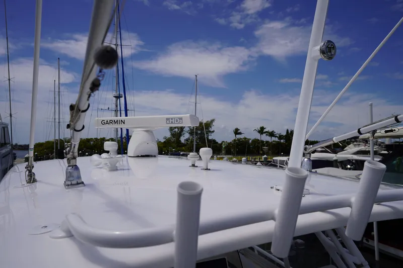 Slide: The Image of 2015 Intrepid 400 Cuddy boat deck with Garmin xHD2 radar under blue sky. - 84