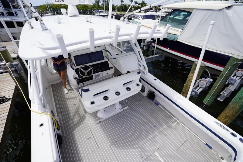 Slide: The Image of 2015 Intrepid 400 Cuddy boat with spacious deck and advanced navigation system. - 88