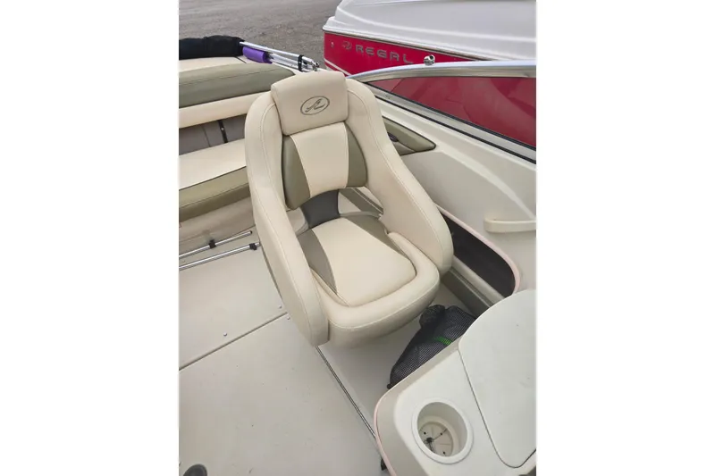 Slide: The Image of Beige seating on 2005 Sea Ray 200 Bow Rider boat interior. - 9
