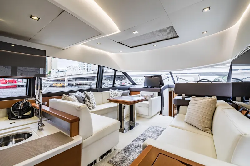 Slide: The Image of Luxurious interior of 2013 Prestige 500 Fly yacht with modern seating and elegant design. - 14