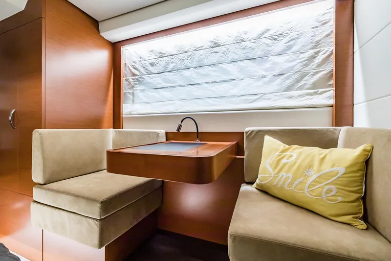 Slide: The Image of Luxurious interior of 2013 Prestige 500 Fly yacht with cozy seating and "Smile" pillow. - 26
