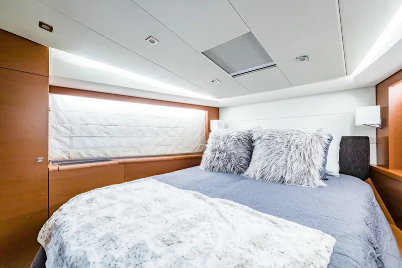 Slide: The Image of Luxurious bedroom interior of 2013 Prestige 500 Fly yacht with plush bedding. - 28