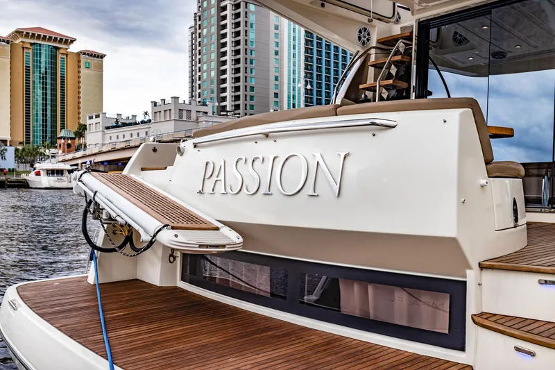 Slide: The Image of Prestige 500 Fly 2013 yacht "Passion" docked near urban buildings. - 9