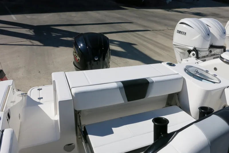 Slide: The Image of 2026 Robalo R230 Center Console boat with Yamaha outboard engines. - 11