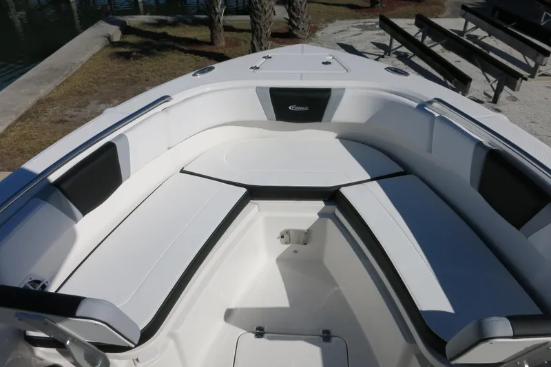 Slide: The Image of 2026 Robalo R230 Center Console boat with spacious seating area and sleek design. - 15