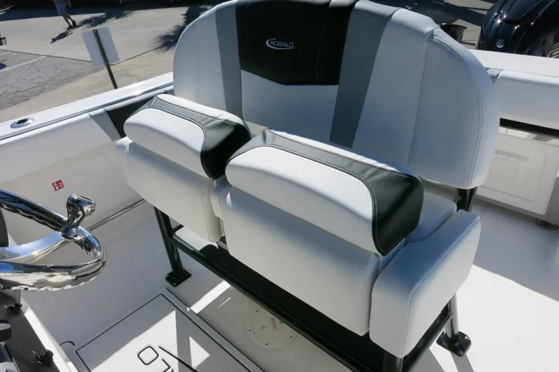 Slide: The Image of 2026 Robalo R230 Center Console boat seating with sleek, modern design and comfortable upholstery. - 23