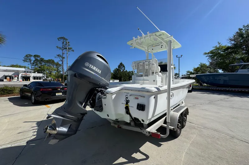 Slide: The Image of 2019 Sea Hunt BX 22 BR boat with Yamaha outboard motor on trailer. - 10