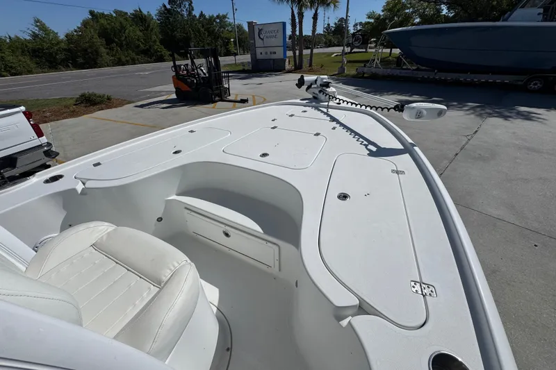 Slide: The Image of 2019 Sea Hunt BX 22 BR boat interior with seating and storage compartments. - 15
