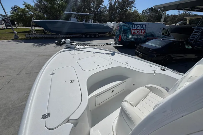 Slide: The Image of 2019 Sea Hunt BX 22 BR boat interior with seating and storage compartments. - 17