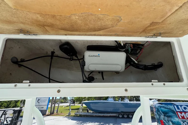 Slide: The Image of 2019 Sea Hunt BX 22 BR boat compartment with Garmin electronics installed. - 32