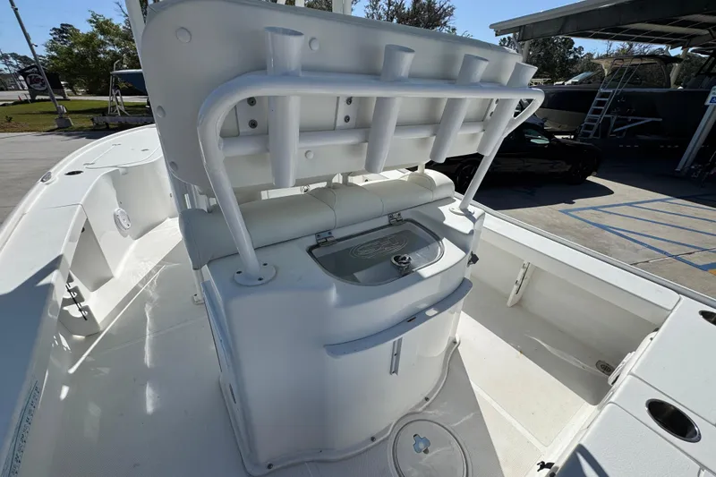 Slide: The Image of 2019 Sea Hunt BX 22 BR boat interior with rod holders and storage compartments. - 33