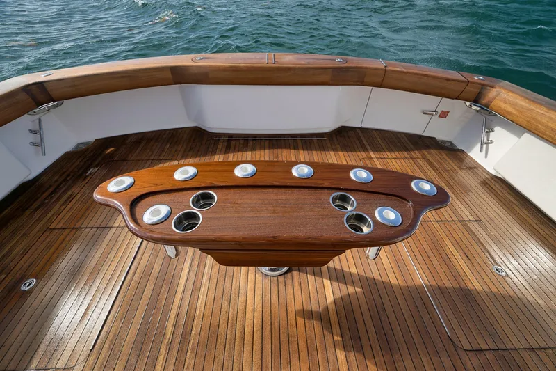 Slide: The Image of Teak deck and fishing station on 2015 Viking 76 Enclosed Bridge yacht. - 21