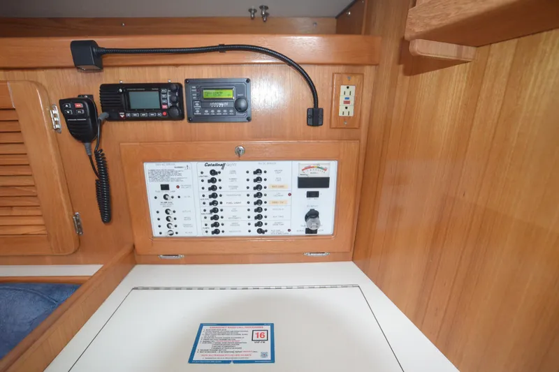 Slide: The Image of Electrical panel and radio equipment on a 2003 Catalina 36 MkII sailboat. - 13