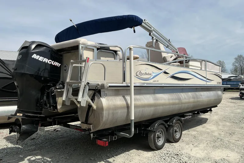 Slide: The Image of 2008 Misty Harbor 2285GM Grand Mistique pontoon boat with Mercury outboard motor on trailer. - 6