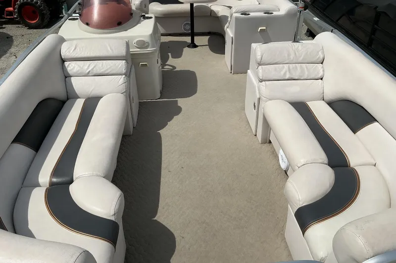 Slide: The Image of 2008 Misty Harbor 2285GM Grand Mistique pontoon boat interior with plush seating. - 7