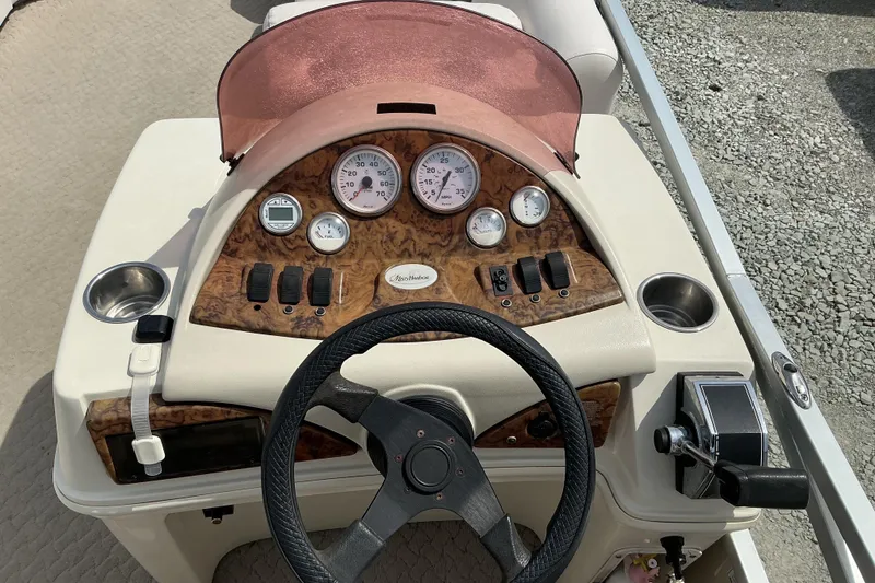 Slide: The Image of Steering console of 2008 Misty Harbor 2285GM Grand Mistique boat with gauges and controls. - 9