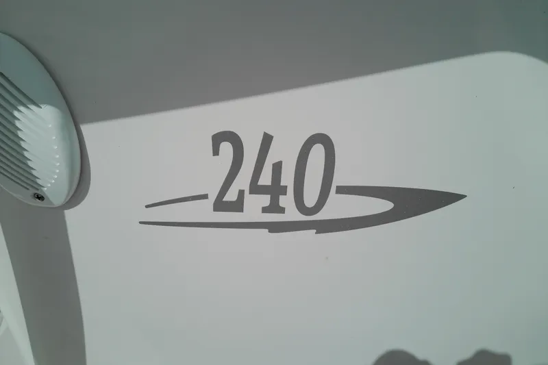 Slide: The Image of Glasstream 240 CC 2023 model logo on boat surface. - 12