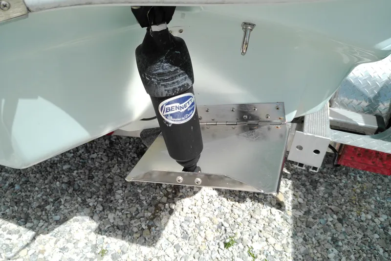 Slide: The Image of 2023 Glasstream 240 CC boat with Bennett Marine trim tab system. - 27