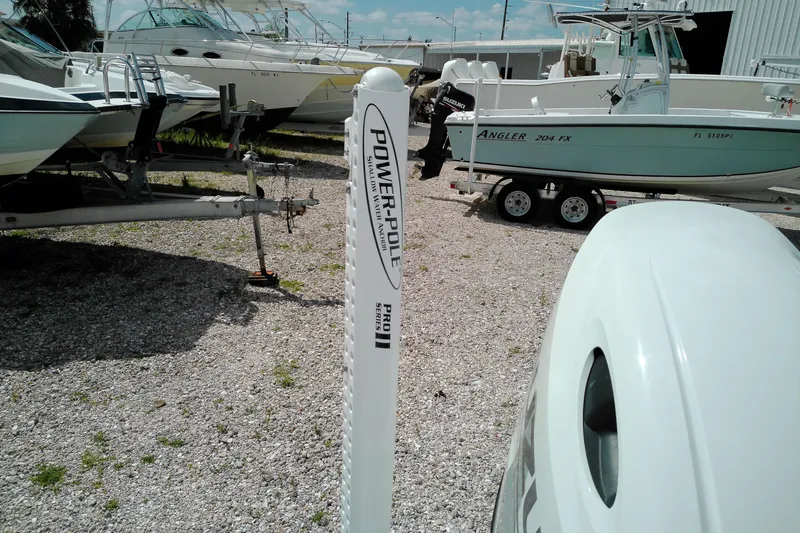Slide: The Image of 2023 Glasstream 240 CC boat with Power-Pole anchor in a boatyard. - 7