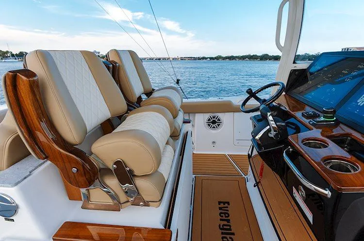 Slide: The Image of Manufacturer Provided Image: 2025 Everglades 315 Center Console boat interior with luxurious seating and advanced dashboard. - 2