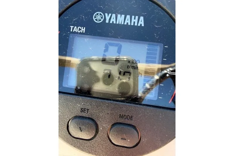 Slide: The Image of Yamaha tachometer display on 2022 Scout 195 Sport Dorado boat. - 8